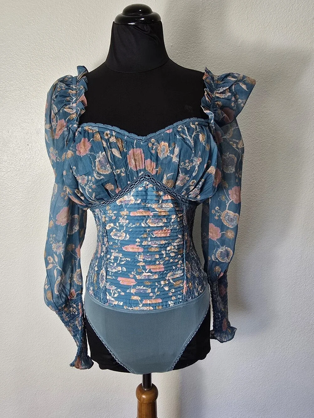 Free People Turquoise Floral Smocked  Long Sleeve Bodysuit.